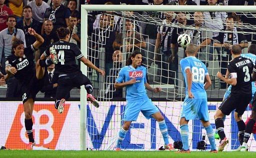 Juventus' Jose Caceres (2ndL) scores a goal Juventus' Jose Caceres (2ndL) scores a goal