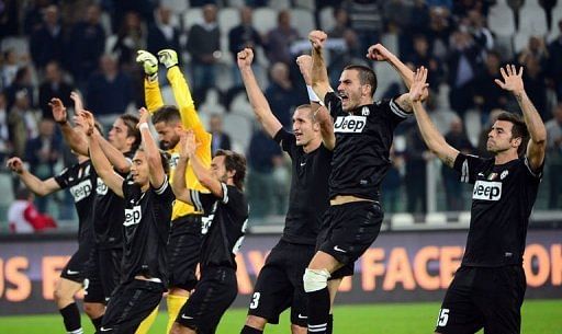 Juventus players celebrate their victory Juventus players celebrate their victory