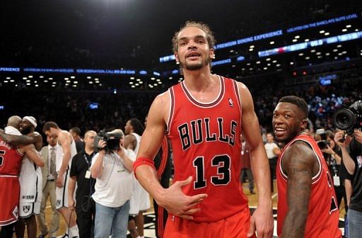 Joakim Noah (C) and Nate Robinson (R) of the Chicago Bulls celebrate their 99-93 win over the Brooklyn Nets, May 4, 2013 Joakim Noah (C) and Nate Robinson (R) of the Chicago Bulls celebrate their 99-93 win over the Brooklyn Nets, May 4, 2013