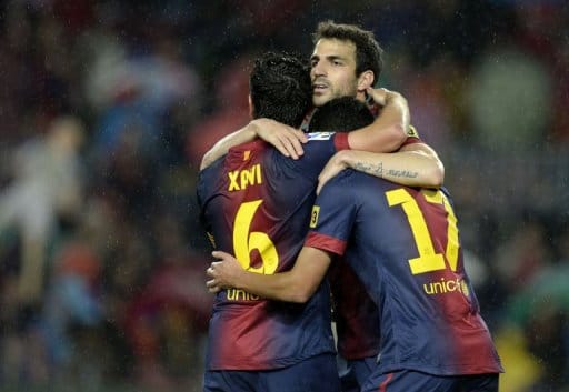 Rain kings Barca stay on course for 100 points
