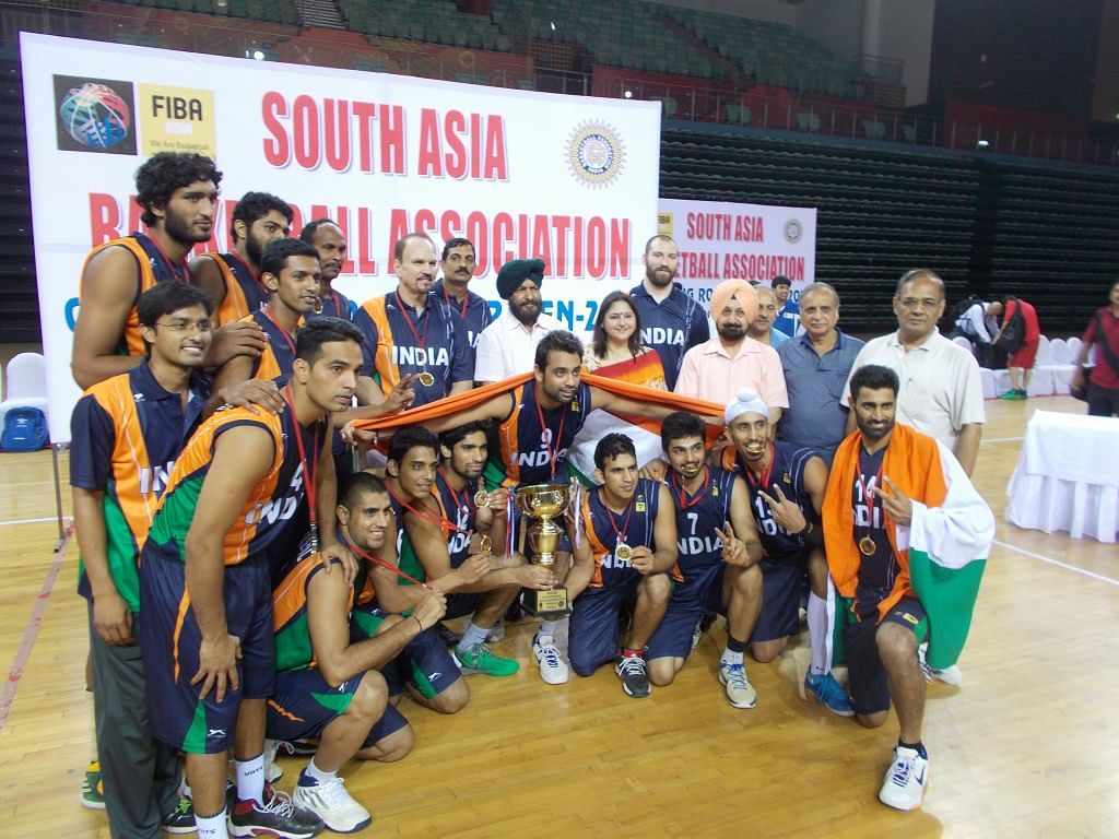 On the right track. Coach Flemming with the victorious Indian Men's team that has qualfied for the FIBA Asia Championships. Copyright: Gopalakrishnan R