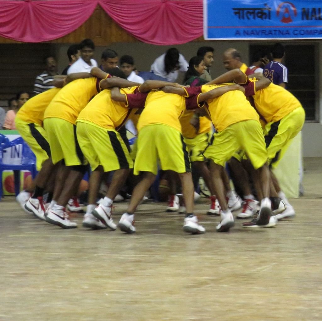 Karnataka boys' team in a pre-game huddle before their match against Madhya Pradesh. Copyright: Clint Furtado/BFI