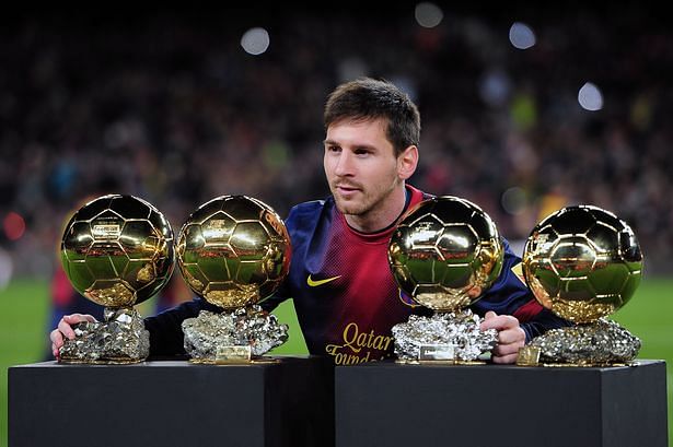 barcelonas-argentinian-forward-lionel-messi-poses-with-his-4-fifa-ballon-dor-trophies-prior-to-the-spanish-copa-del-rey-1404807659-1411481622.jpg
