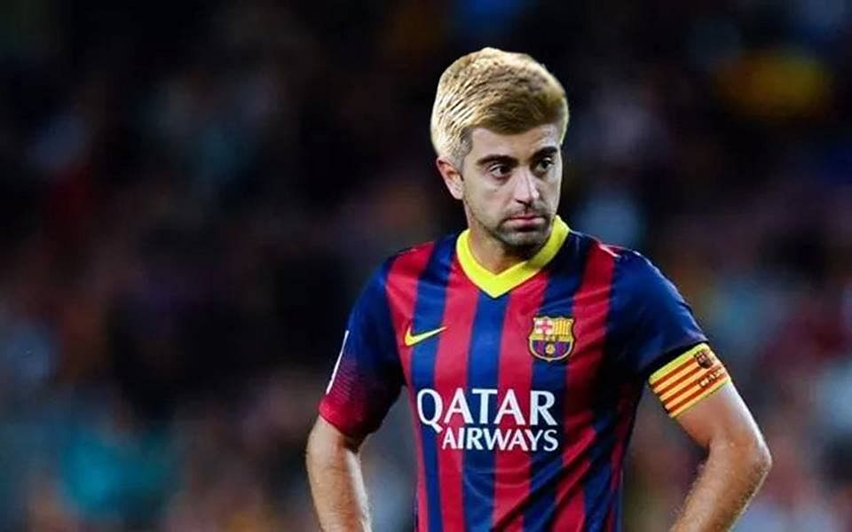 ... that, giving Xavi Real Madrid midfielder Toni Kroos ? hairstyle