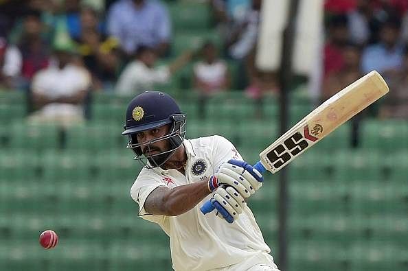 Murali Vijay fined 25% match fees for sporting two logos on bat