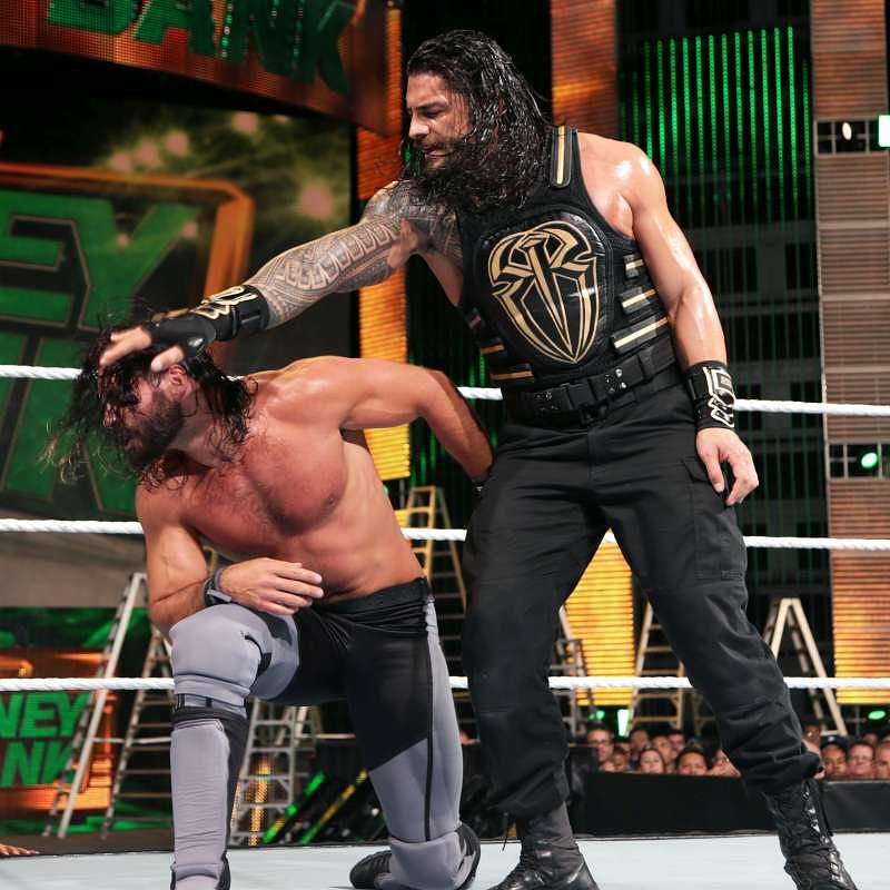 WWE World Heavyweight Champion Roman Reigns vs. Seth Rollins photos