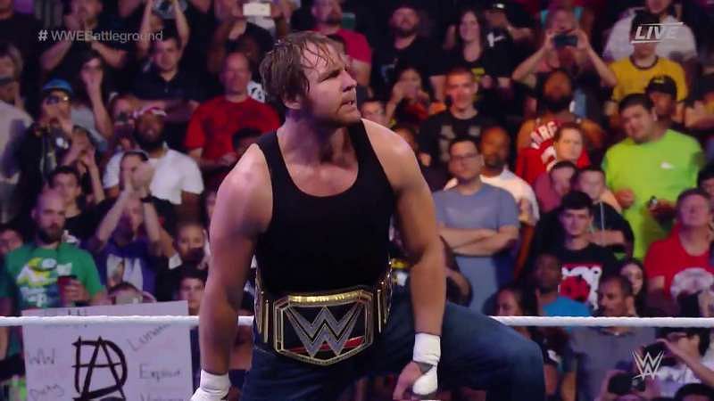 Dean Ambrose defends his WWE championship against Roman Reigns and Seth Rollins
