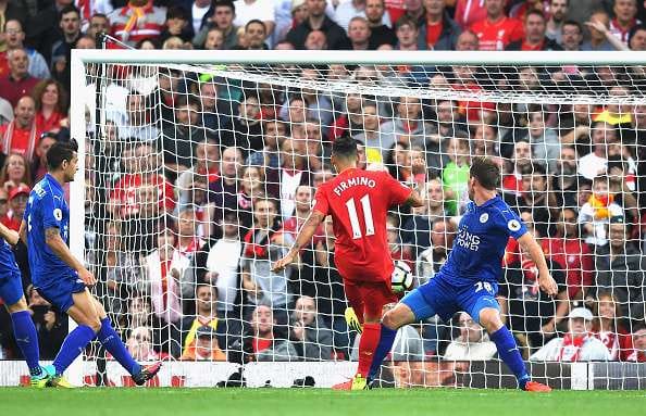 LIVERPOOL, ENGLAND - SEPTEMBER 10: Roberto Firmino of Liverpool scores his sides fourth goal during the Premier League match between Liverpool and Leicester City at Anfield on September 10, 2016 in Liverpool, England.  (Photo by Michael Regan/Getty Images)