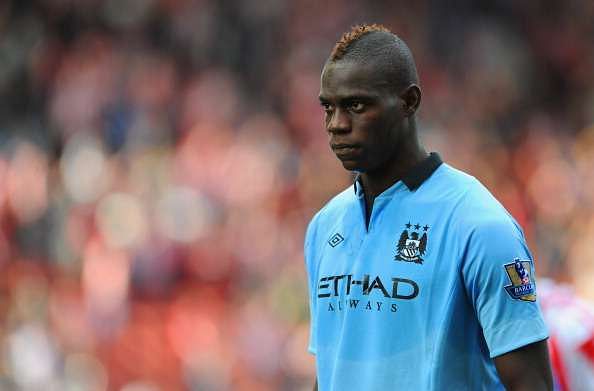 STOKE ON TRENT, ENGLAND - SEPTEMBER 15: Mario Balotelli of Manchester City looks on during the Barclays Premier League match between Stoke City and Manchester City at the Britannia Stadium on September 15, 2012 in Stoke on Trent, England.  (Photo by Michael Regan/Getty Images)