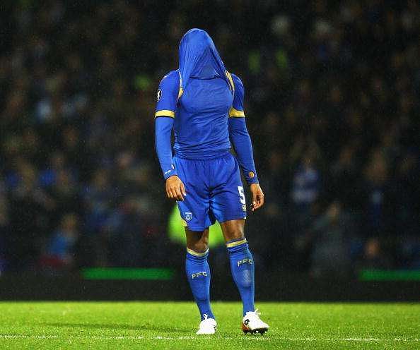 PORTSMOUTH, UNITED KINGDOM - NOVEMBER 27:  Glen Johnson of Portsmouth looks dejected after the UEFA Cup Group E match between Portsmouth and AC Milan at Fratton Park on November 27, 2008 in Portsmouth, England.  (Photo by Paul Gilham/Getty Images)