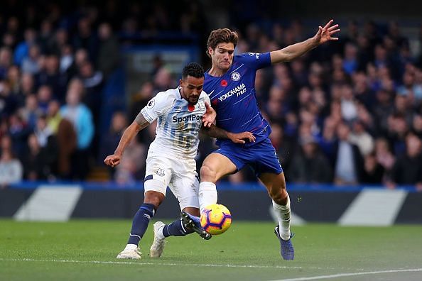 Marcos Alonso (right) tackling Everton winger Theo Walcott