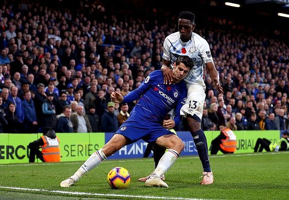Alvaro Morata (left) tussling with Everton defender Yerry Mina (in white) during their Premier League clash at Stamford Bridge