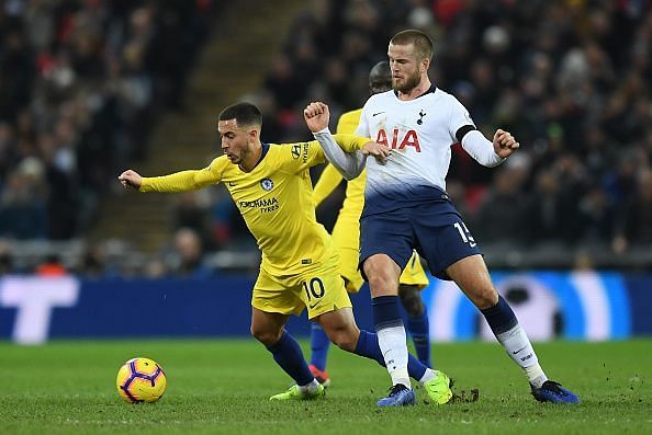 Hazard battling with Tottenham midfielder Eric Dier for possession during a frustrating evening at Wembley