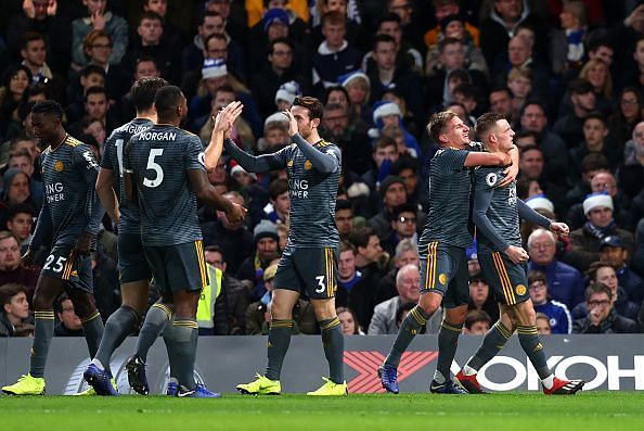 Jamie Vardy (far right) celebrates his goal with teammates on an important afternoon in the Premier League