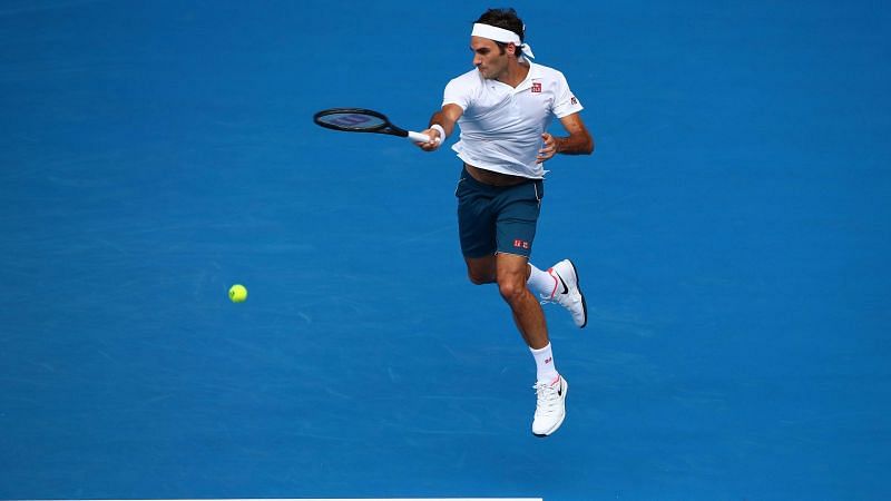 Federer enjoys 'cat and mouse' win over Evans