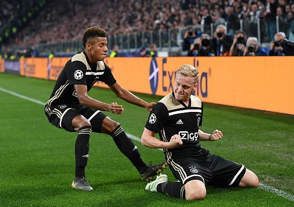 van de Beek (right) celebrates his goal with David Neres during a memorable second leg in Turin