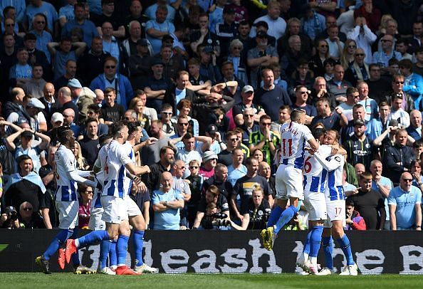 Murray and his Brighton teammates celebrate his 13th league goal of the campaign, giving them a brief lead