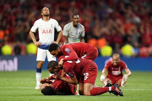 van Dijk, Matip and Gomez celebrate at the full-time whistle after Liverpool's Champions League Final win