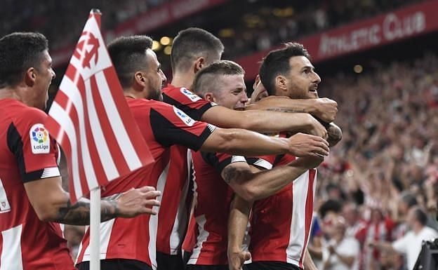 Aduriz celebrates with his teammates after an excellent matchwinner late on against Barcelona