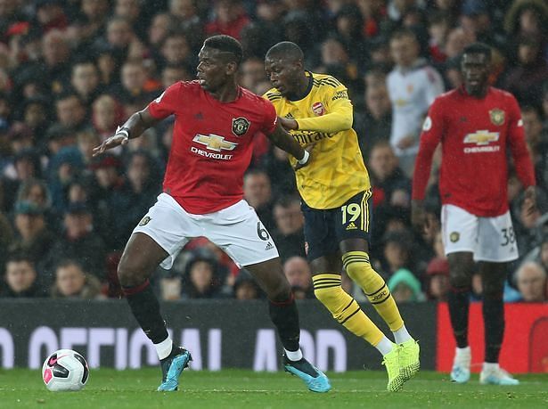 Pepe in pursuit of Paul Pogba on another frustrating evening's work for the Ivorian winger