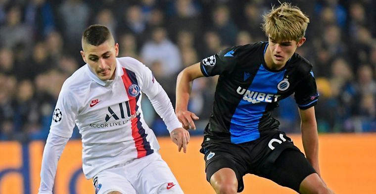 Ketelaere battling with PSG's Marco Verratti on a memorable night for the 18-year-old