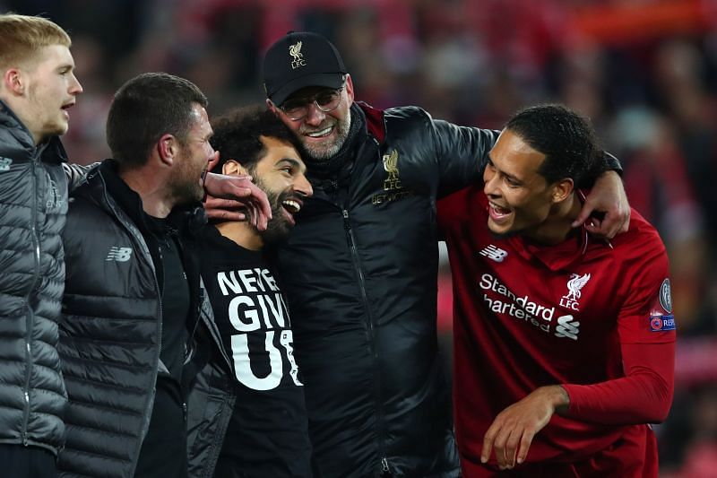 Jurgen Klopp with Van Dijk and Salah after Barcelona game