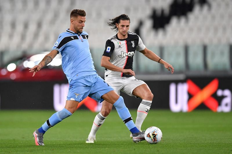 Milinkovic-Savic battling with Juventus' Adrien Rabiot during an action-packed clash in Turin