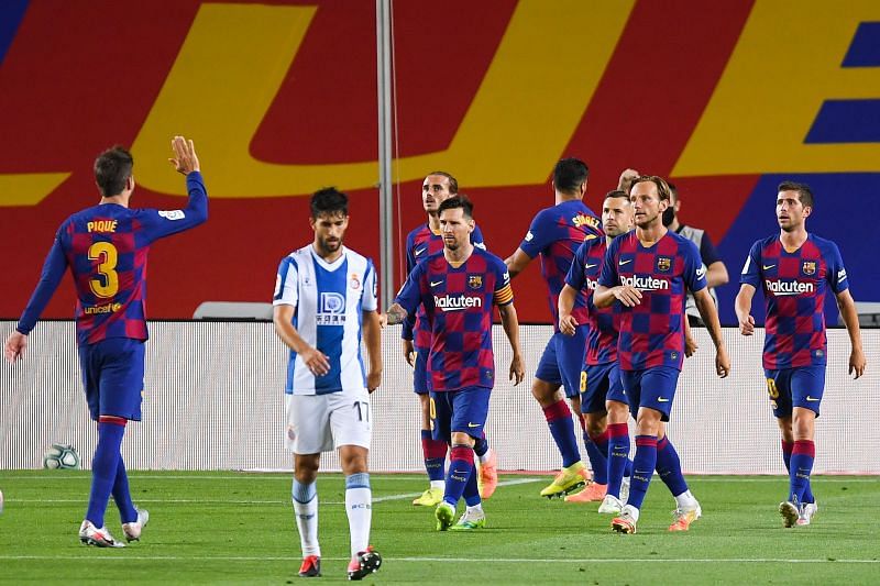 Barcelona players celebrate after Suarez's close-range finish breaks the deadlock just before the hour mark