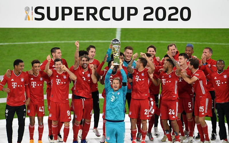 Bayern players celebrate as Manuel Neuer lifts the German Supercup after beating Borussia Dortmund