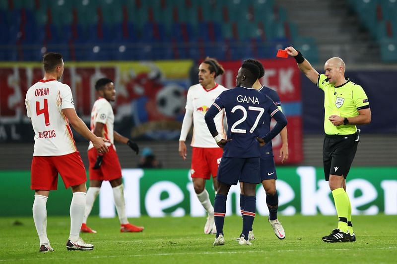 Gueye can't believe his luck as ref Szymon Marciniak shows him red at a crucial moment in the second-half
