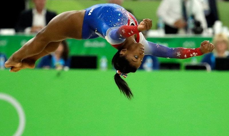 Biles performing at the 2016 Rio Olympic games. S