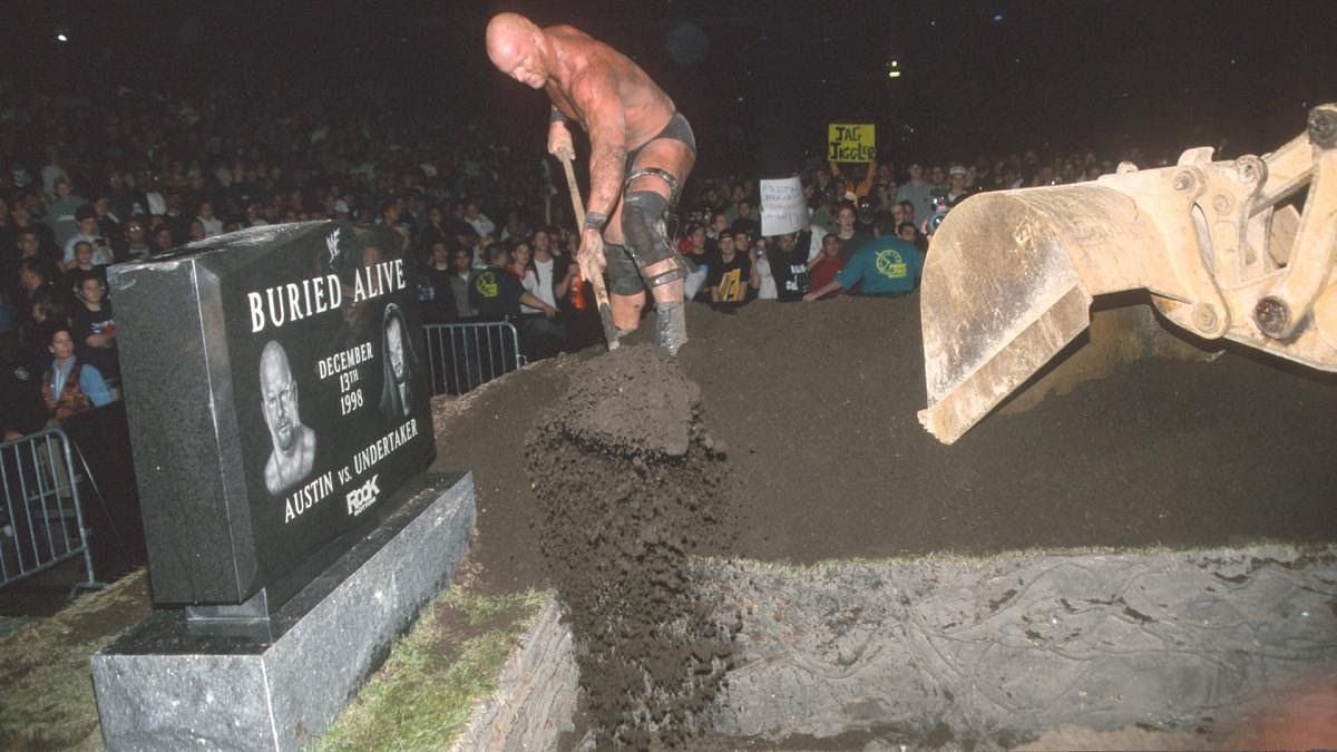Stone Cold burying The Undertaker alive