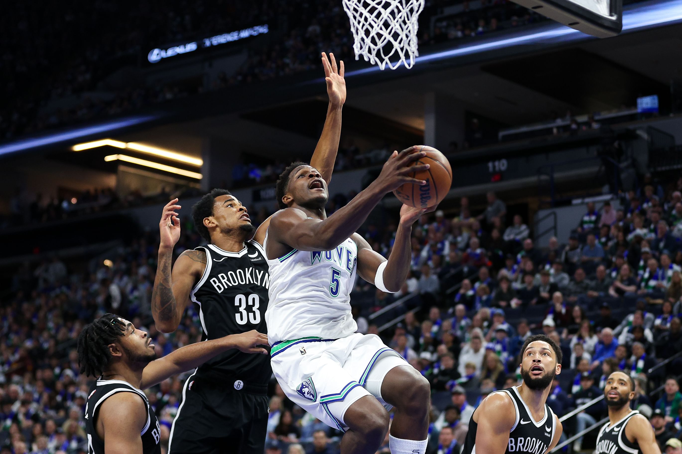 What happened to Anthony Edwards? Timberwolves star helped off court after unusual injury involving Nets HC