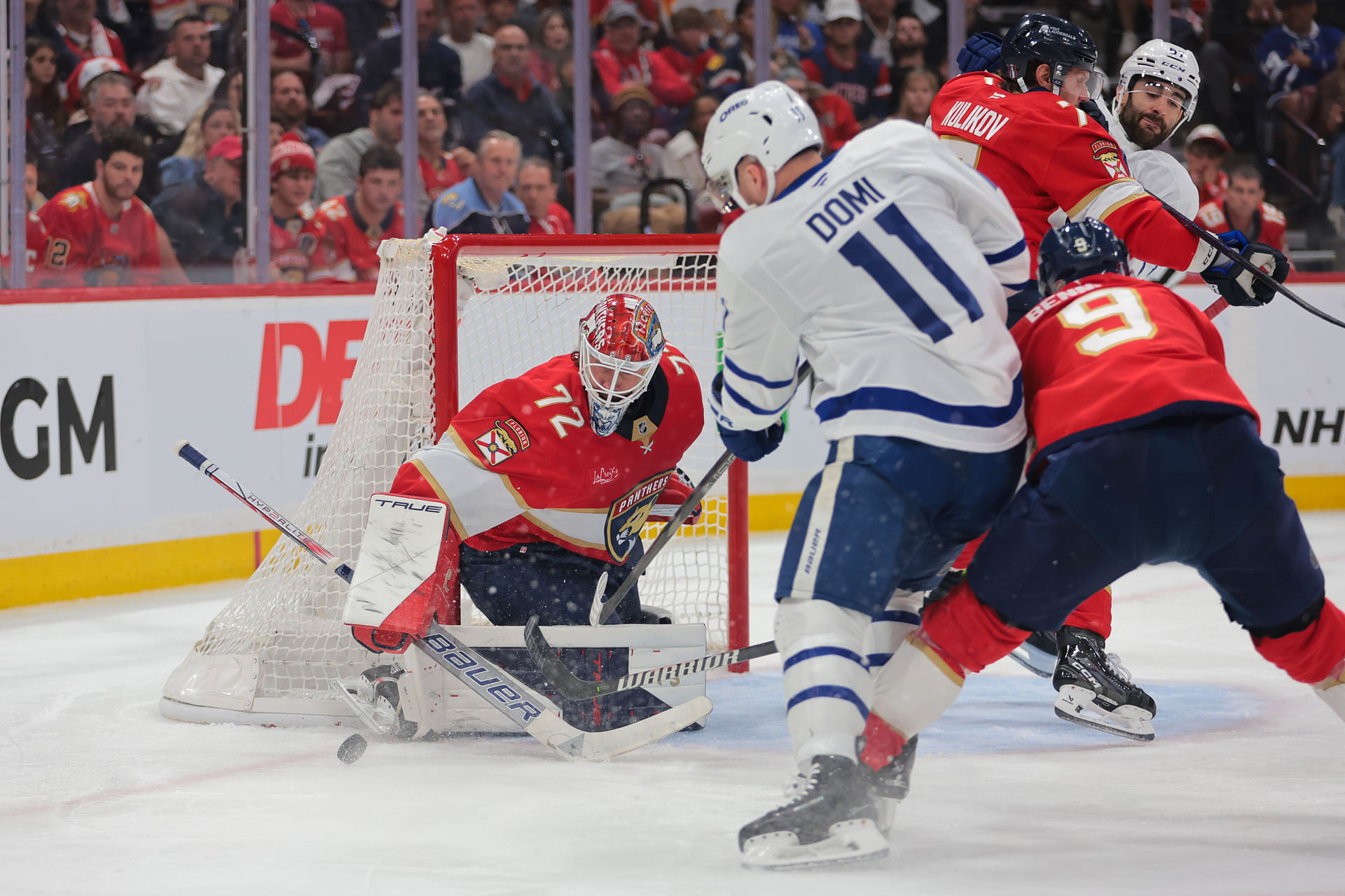 Maple Leafs Max Domi slams Sasha Barkov into boards from behind, massive scrum ensues [WATCH]