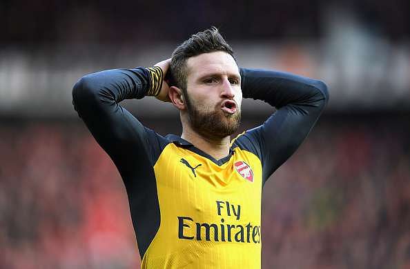 MANCHESTER, ENGLAND - NOVEMBER 19:  Shkodran Mustafi of Arsenal reacts during the Premier League match between Manchester United and Arsenal at Old Trafford on November 19, 2016 in Manchester, England.  (Photo by Shaun Botterill/Getty Images)