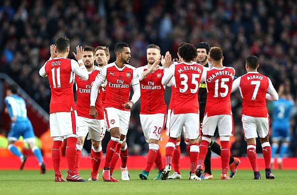 LONDON, ENGLAND - NOVEMBER 27:  Alexis Sanchez of Arsenal celebrates scoring his sides first goal during the Premier League match between Arsenal and AFC Bournemouth at Emirates Stadium on November 27, 2016 in London, England.  (Photo by Shaun Botterill/Getty Images)