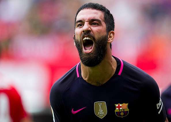 GIJON, SPAIN - SEPTEMBER 24: Arda Turan of FC Barcelona celebrates after scoring his team's fourth goal during the La Liga match between Real Sporting de Gijon and FC Barcelona at Estadio El Molinon on September 24, 2016 in Gijon, Spain.  (Photo by Juan Manuel Serrano Arce/Getty Images)